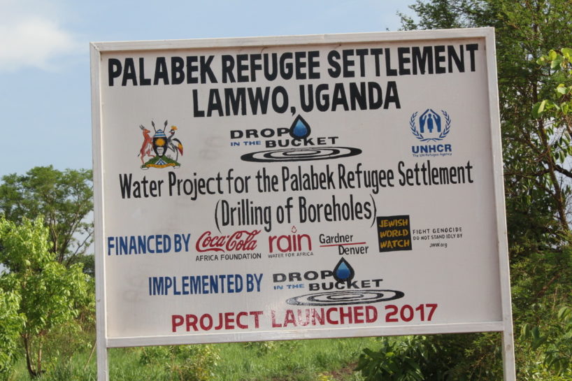 World Refugee Day - Sign for the Palabek Refugee Settlement, Lamwo, Uganda. World Refugee Day - Sign for the Palabek Refugee Settlement, Lamwo, Uganda.