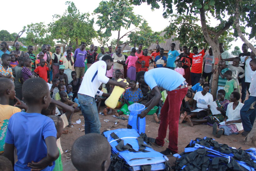 World Refugee Day - Drop in the Bucket field staff distributing Pack H2O water backpacks at the Palabek Refugee Settlement in Uganda. World Refugee Day - Drop in the Bucket field staff distributing Pack H2O water backpacks at the Palabek Refugee Settlement in Uganda.